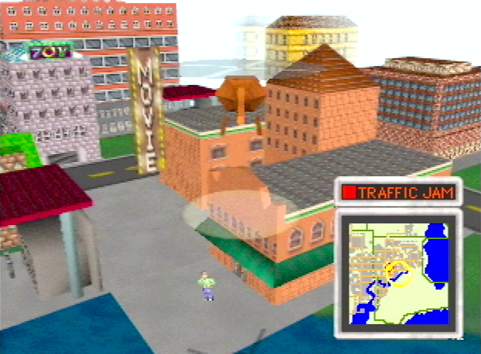 A view of an office building on a street corner with a movie theater marquee attached to the exterior. This screenshot is from the E3 1997 build of SimCopter 64. The scene is much brighter and more colorful than the PC version. The theater building itself is a different design with a storefront.