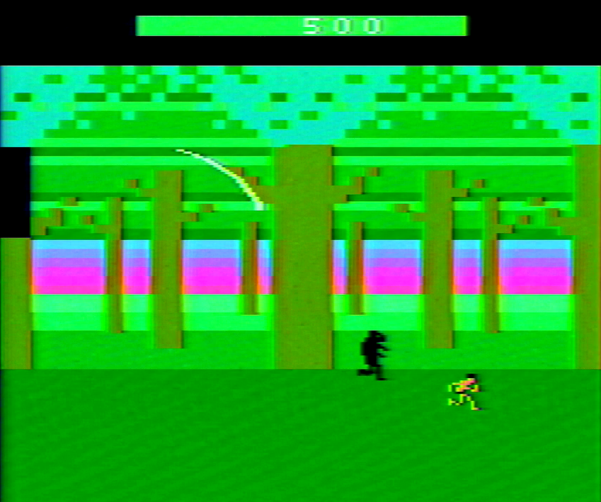 Bolgani, a black-colored ape, chases after Tarzan.