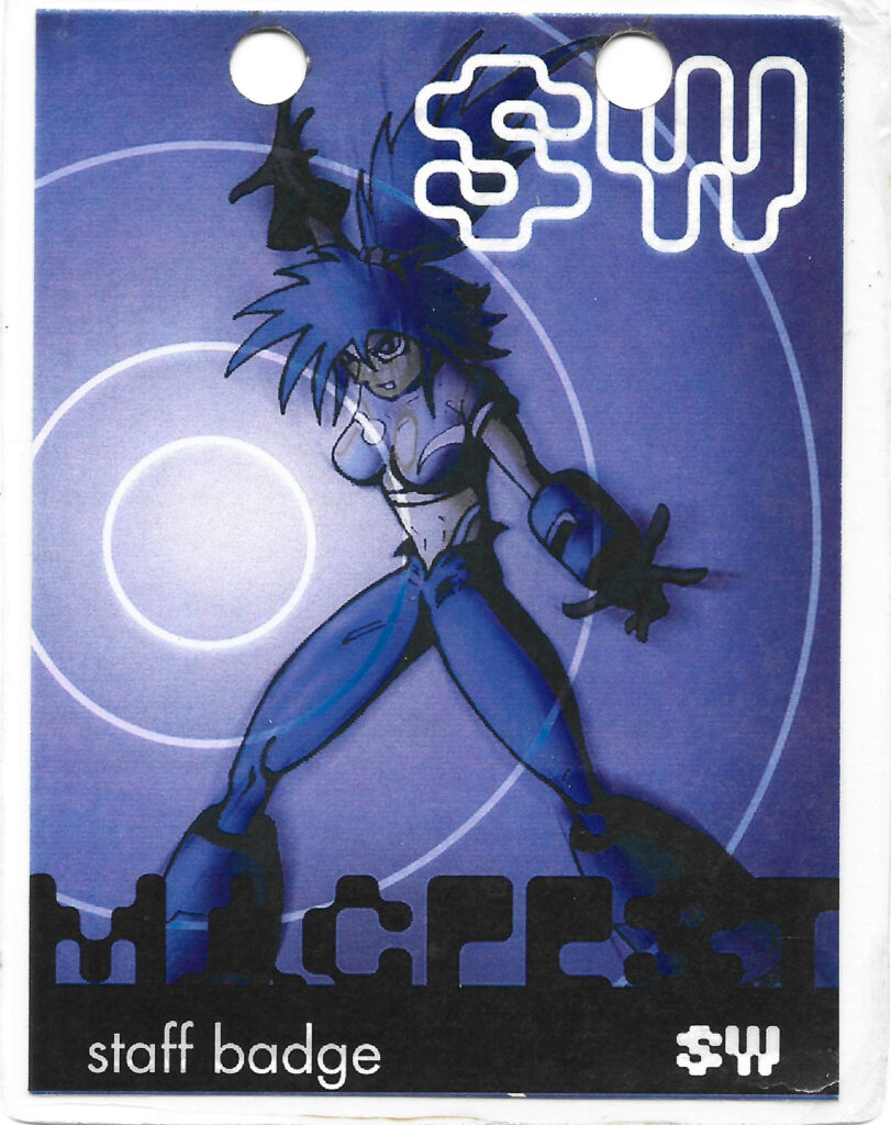 A staff badge for MAGFest 1, featuring the event's anime-style mascot.