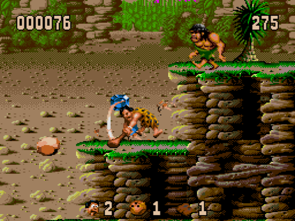 Fred Flintstone swinging a club at a rock.