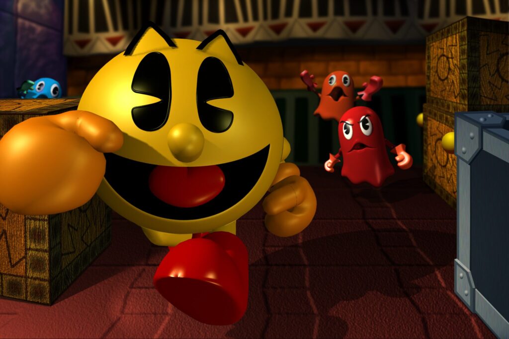 Artwork from Pac-Man World. Pac-Man is running around a temple maze, pursued by ghosts.