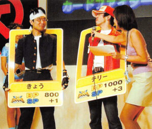 Cosplayers dressed up as character cards from SNK vs. Capcom: Card Fighters' Clash.